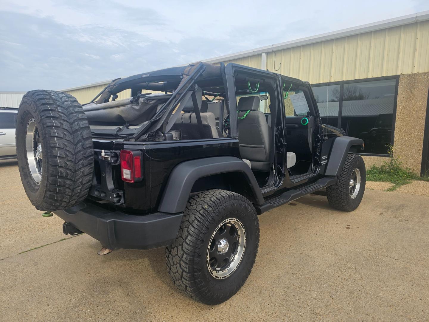 2010 BLACK Jeep Wrangler Unlimited Sport 4WD (1J4BA3H16AL) with an 3.8L V6 OHV 12V engine, located at 533 S Seven Points BLVD, Seven Points, TX, 75143, (430) 255-4030, 32.313999, -96.209351 - Photo#2